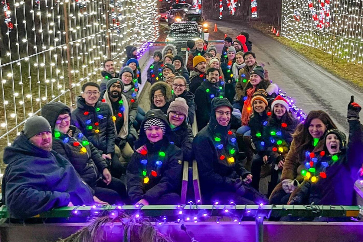 wagon ride of people going through Shady Brook Farm's Holiday Light Show.